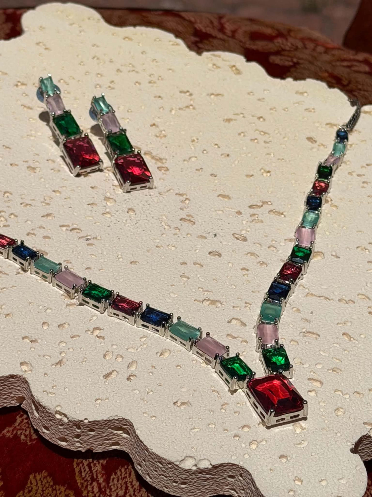 Emerald and ruby crystal necklace close-up