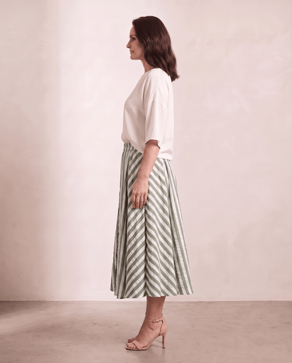Willow Skirt in green stripe, side view, shown on a digitally generated model