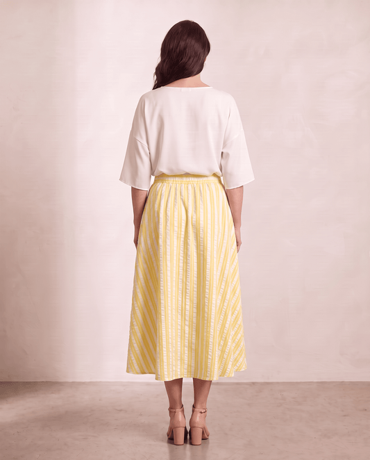 Willow Skirt in yellow stripe, back view, shown on a digitally generated model