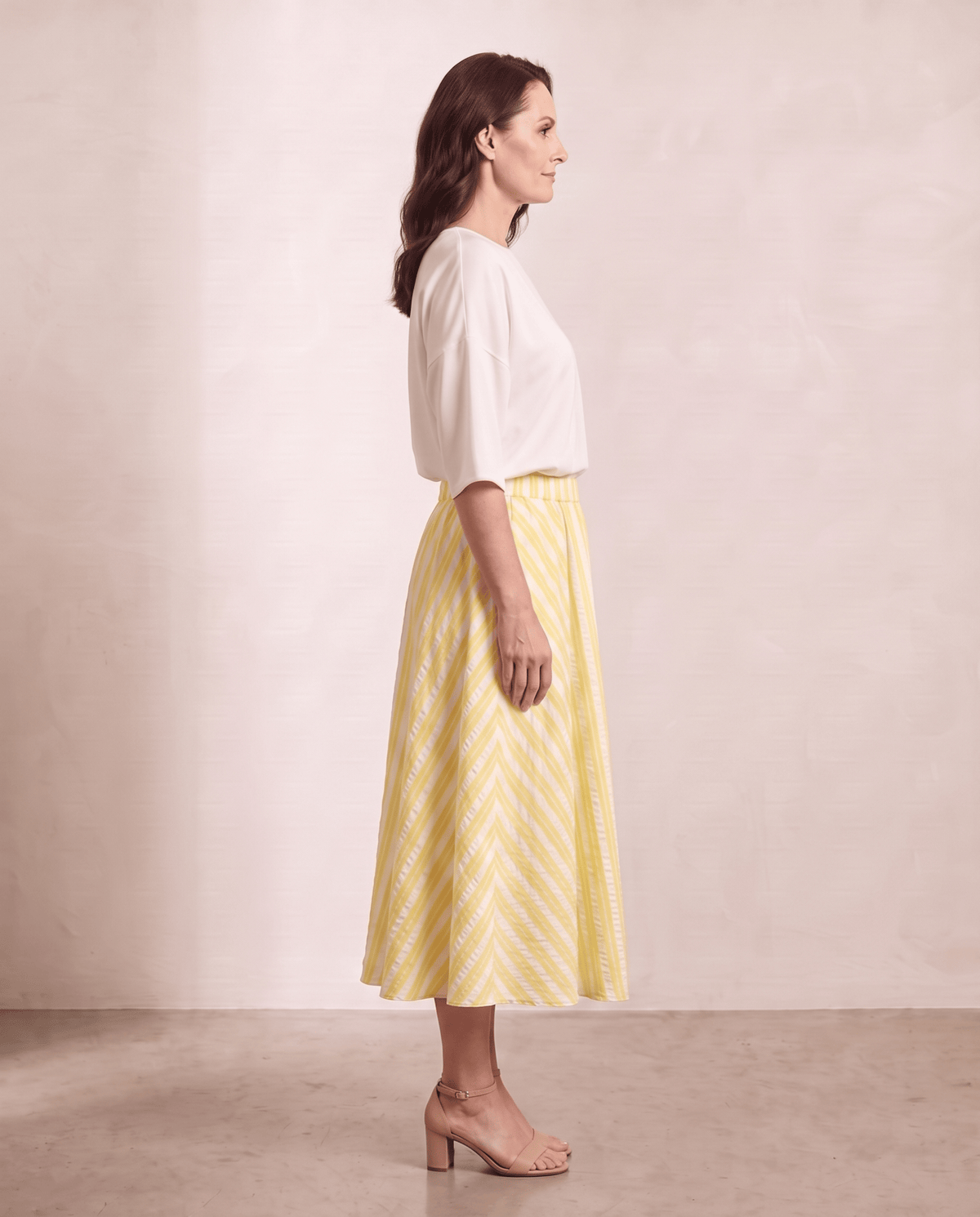 Willow Skirt in yellow stripe, side view, shown on a digitally generated model