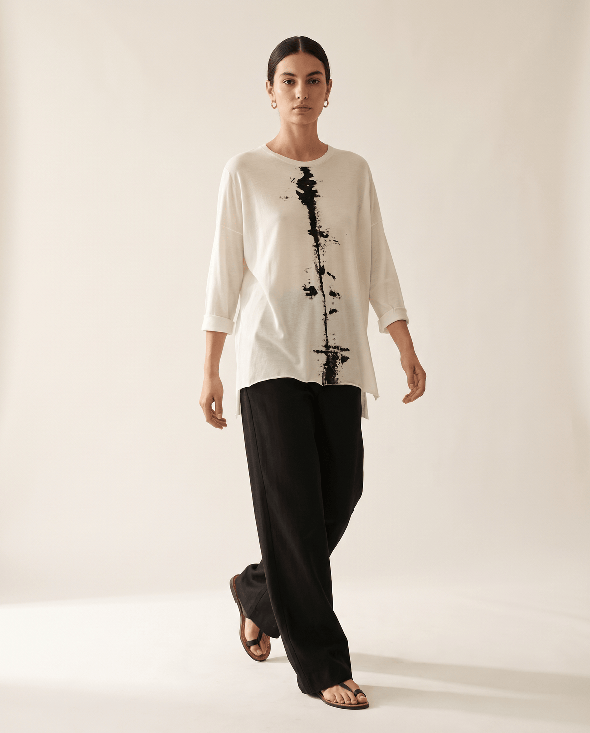 Higgsfield render - Ink Splatter Boxy Knit Tee walking