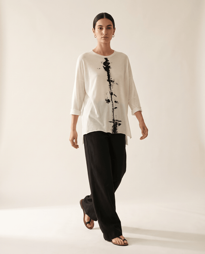 Higgsfield render - Ink Splatter Boxy Knit Tee walking