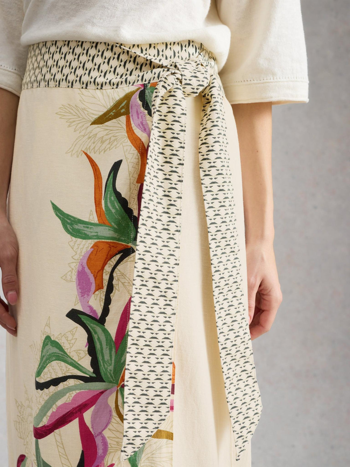 White Stuff Alba Linen Blend Wrap Skirt, close detail of the print and wrap front - Pinkhill Darwin